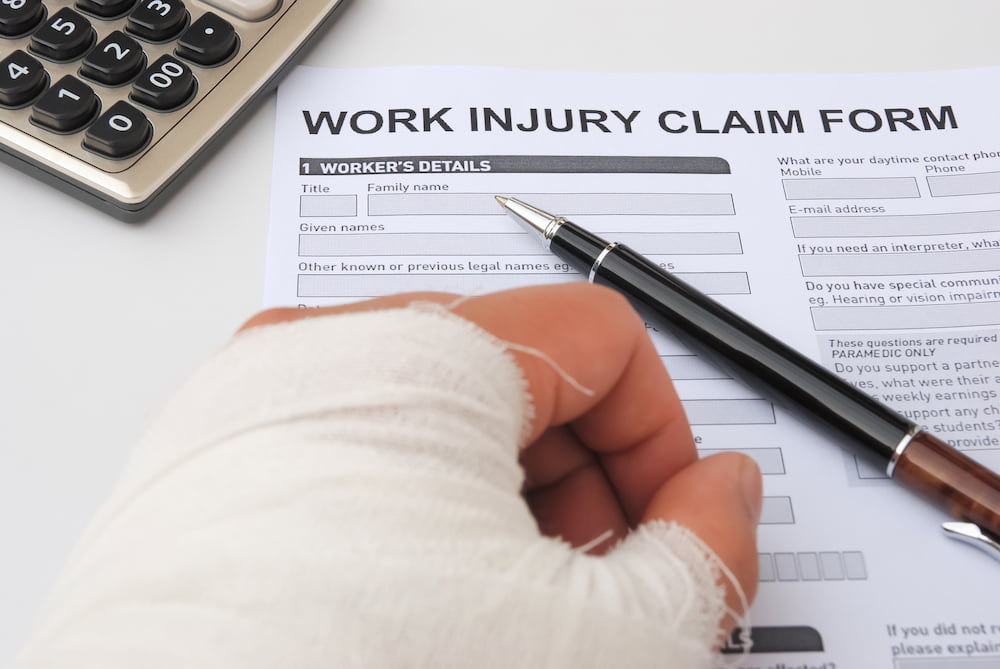 Injured hand and work injury claim form